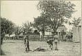 A dead Confederate soldier of General Ewell's Corps on a stretcher in front of the Alsop Farm House