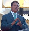 Schwarzenegger in December 2009 speaking at a ceremony for James Cameron to receive a star on the Hollywood Walk of Fame