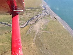 Aerial shot of Chariot, AK located near Cape Thompson. The once-proposed site of an artificial harbor created using chained nuclear explosions.