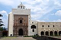 The bell-gable on top of the convent of Acolman, Mexico.