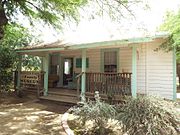 The Schnepf House. The century old house which served as the home of Ray and Thora Schnepf. The house is located in the grounds of the Schnepf Farm at 22601 East Cloud Road in Queen Creek, Arizona.