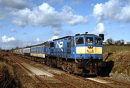 Northern Ireland Railways GM built 112 brings what should be the 08.00 passenger service from Dublin (Connolly) to Belfast (Central) towards the remains of Damhead station