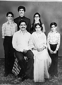 Black and white family photograph of Kirori Singh Bainsla, Resham Bainsla, Jai Singh Bainsla, Daulat Singh Bainsla, Sunita Bainsla, and Vijay Singh Bainsla