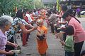 Image 50Buddhist novices receiving joss sticks. (from Culture of Thailand)