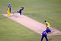 Muttiah Muralitharan bowls to Adam Gilchrist in a one-day international at Brisbane. Gilchrist went on to hit a century off 67 balls. Muralitharan finally bowled him for 122.