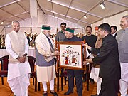 Narendra Modi being welcomed by the Governor of Himachal Pradesh, Shri Acharya Devvrat and the Chief Minister of Himachal Pradesh, Shri Virbhadra Singh, at a function, in Mandi, Himachal Pradesh 18 October 2016