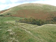 The grassy dome of Little Mell Fell, seen over The Hause from Watermillock Fell