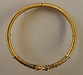 Achaemenid torc from Persia, c. 350 BC, Susa, with ribbed hoop, animal head terminals, and stone inlays, from the Acropole Tomb