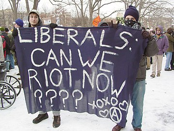 Black Bloc demonstrators taunting liberal protesters at a 2005 protest