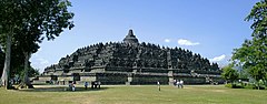 Massive and convoluted artificial stone structure that roughly resembles a terraced truncated pyramid