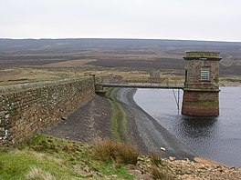 Image of an upland lake and valve tower surrounded by moorland
