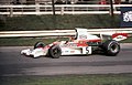 Marlboro colours first appeared on a McLaren in the 1974 season. This is Emerson Fittipaldi driving the McLaren M23 at the 1974 British Grand Prix.