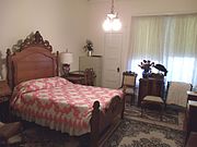 Main bedroom of the Manistee Mansion .