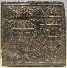 Stone carving from the Eastern Han dynasty, with depiction of a waterside pavilion overlooking a lake full of fish, turtles, and waterfowl