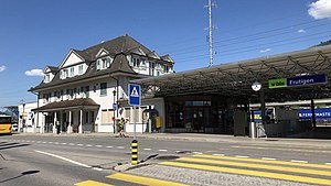 Three-story building with hip roof