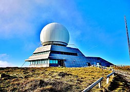 An air traffic control radar station is located on the summit.