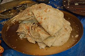 Petai Paratha (Smashed Paratha), a West Bengal variant served with light vegetable curry