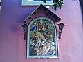 Azulejo of souls in purgatory, Seville, Spain. Top: Trinity, with Mary. Middle: angels pulling purged souls upward. Bottom right: soul being purged by fire, depicted placid and untortured.