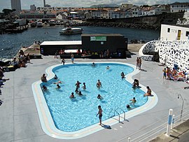 Municipal swimming pools, showing the Porto dos Carneiros and urbanized core of the civil parish of Nossa Senhora dos Rosário