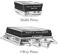 Two black-rimmed squares of glass. Above, one with rows of identical small prism ridges. Below, one with three pendants like those in the last image, but increasing successively in size.