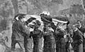 The coffin of Lieutenant Reginald Warneford being carried to his burial plot in Brompton Cemetery by members of the Royal Naval Division on June 21, 1915.