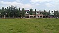 Distant shot of Shree Buddha Adarsha Uccha Madhyamik Vidyalaya, the oldest educational institution in the village