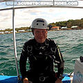 Technical diver with sidemount helmet, pre-dive.