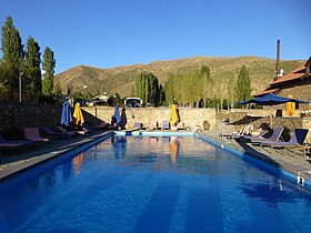 Hotel pool with a mountain view