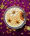 Kheer topped with dried fruits and nuts