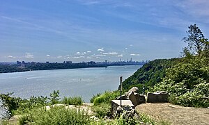 Atop the Hudson Palisades in Englewood Cliffs, overlooking the Hudson River, the George Washington Bridge, and the skyscrapers of Midtown Manhattan