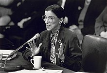 Ginsburg speaking into microphone at Senate confirmation hearing on her for her Supreme Court appointment