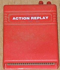 A large square software cartridge in a red case.