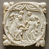 A couple playing chess, ivory mirror case c. 1300