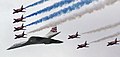 Image 47Concorde (and the Red Arrows with their trail of red, white and blue smoke) mark the Queen's Golden Jubilee. With its slender delta wings Concorde won the public vote for best British design. (from Culture of the United Kingdom)