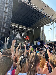 Coin performing at slope day in 2023.
