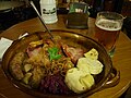 Image 41A "traditional Bohemian platter" at a restaurant in central Prague, consisting of roast duck, roast pork, beer sausage, smoked meat, red and white cabbage, bread, bacon and potato dumplings. (from Czech cuisine)