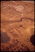 Patterned ground in Alaska. The center is lower; hence full of water. This scene is like low-center polygons on Mars—but with water.