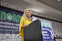 Eleanora Kennedy introducing recipient of NORML's 2019 Michael J. Kennedy Social Justice Award. Photo courtesy of NORML, permission granted.