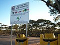 Fruit disposal bins and warning signs along Calder Highway, approaching the Fruit Fly Exclusion Zone near Mildura.