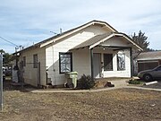 The Apartments built in the early 1900s and located at 7153 N 57th Dr.