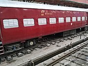 A red ICF coach used on an unnamed train