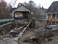 Damage caused by flood waters to the Quechee covered bridge on the northern shore of the river.