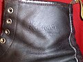 Dr. Martens logo stamped on the outer side of a boot