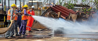 Fire fighting mock drill at ship recycling yard in Alang, India
