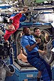 Leland with his crewmates in the Destiny lab during STS-122