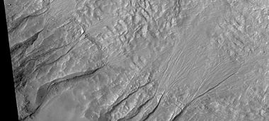 Close up of gully aprons, as seen by HiRISE under HiWish program. Note this is an enlargement of the previous image of gullies in a crater.