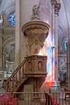 Pulpit, with the colourful lighting from the stained glass