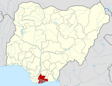 Port Harcourt is located in Rivers State which is shown in red.