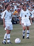 U.S. players Kristine Lilly and Mia Hamm in 1998