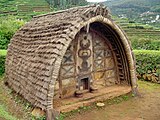 D-33 Description: Indian vernacular architecture. A Toda tribal hut (Featured article)